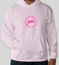 Load image into Gallery viewer, The conscious hoodie has arrived. There is no place for any type of hatred. This is all love.  The focus is peace, love and unity. Stay cool and cozy in our No Hate Gear Hoodie from the No Hate Gear Collection. This color is Pale Pink  with  Florescent Pink Letters. The No Hate Symbol is on the front with All Love on the back.  By Art of Love Apparel &amp; Decor